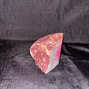 piece of pink-dyed agate geode